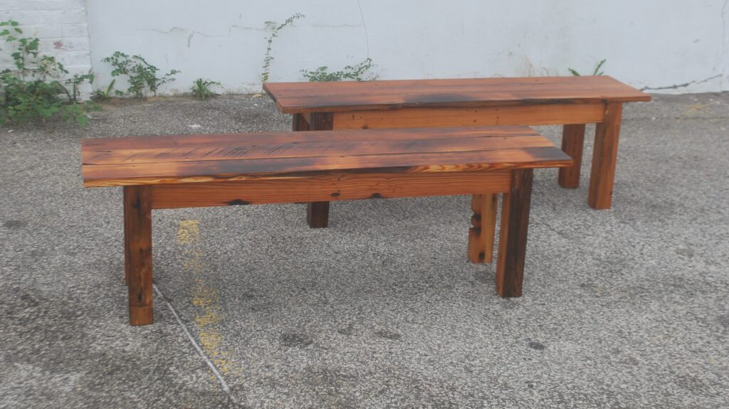 two dark brown benches