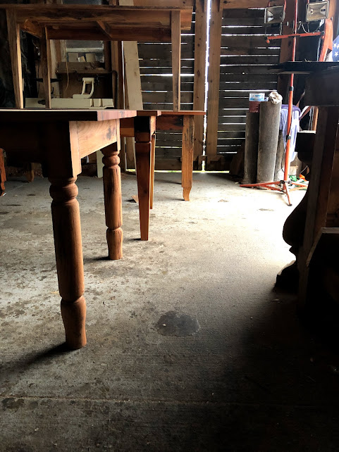 wooden tables being crafted in the workshop